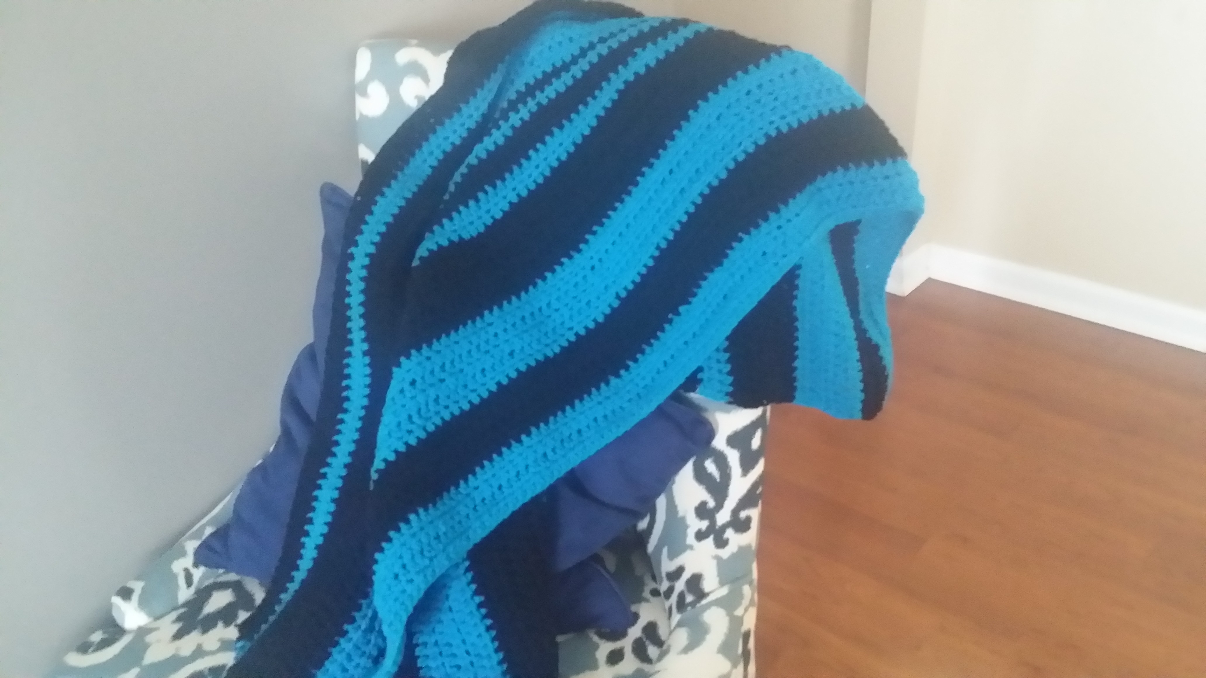 Blue and black throw blanket