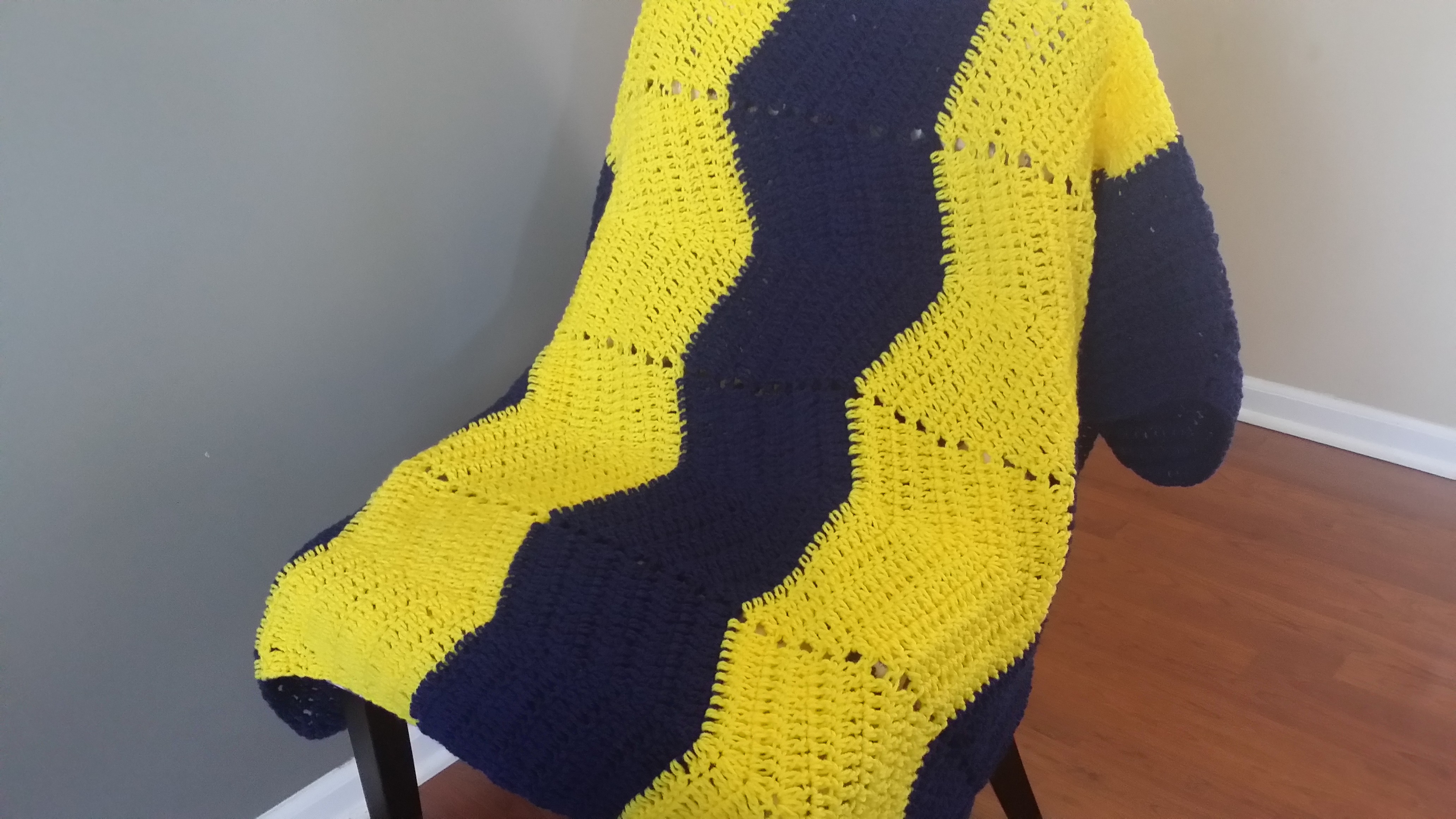 Yellow and black throw blanket